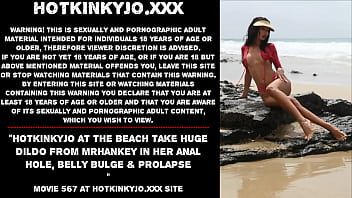 Play Hotkinkyjo at the beach take huge dildo from mrhankey in her anal hole, belly bulge & prolapse