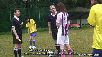 Play Asian soccer player gets a yellow card and a cock