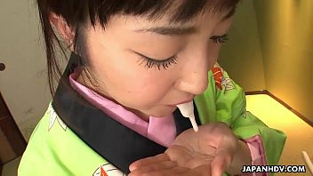Play Asian bitch in a kimono sucking on his erect prick