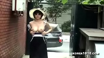 Play Sexy Korean MILF shows her tits in public