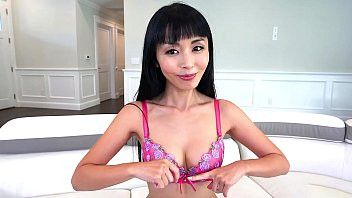 Play Tiny asian chick sucks two huge cocks